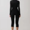 Body aderente a maniche lunghe con collo a cappuccio Ren – Nero Body aderente a maniche lunghe con collo a cappuccio Ren – Nero