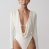 Body aderente a maniche lunghe con scollo a barchetta Ren – Avorio Body aderente a maniche lunghe con scollo a barchetta Ren – Avorio