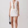 Top senza maniche con ricamo Tessa e scollo allacciato sul davanti – Bianco Top senza maniche con ricamo Tessa e scollo allacciato sul davanti – Bianco