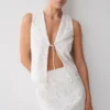 Top senza maniche con ricamo Tessa e scollo allacciato sul davanti – Bianco Top senza maniche con ricamo Tessa e scollo allacciato sul davanti – Bianco