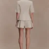 Pantaloncini di lino a pieghe Martine – Naturale Pantaloncini di lino a pieghe Martine – Naturale