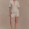 Pantaloncini di lino a pieghe Martine – Naturale Pantaloncini di lino a pieghe Martine – Naturale
