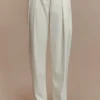 Pantaloni a vita alta con pieghe Penelope – Avorio