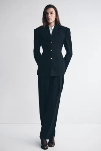 Pantaloni a vita alta plissettati Penelope – Nero Pantaloni a vita alta plissettati Penelope – Nero