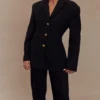 Pantaloni a vita alta plissettati Penelope – Nero Pantaloni a vita alta plissettati Penelope – Nero