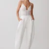 Body in pizzo trasparente con scollo a V Jasper – Avorio Body in pizzo trasparente con scollo a V Jasper – Avorio