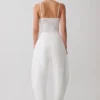 Body in pizzo trasparente con scollo a V Jasper – Avorio Body in pizzo trasparente con scollo a V Jasper – Avorio