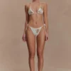 Slip bikini all’uncinetto Huntleigh – Stampa Sunshine bianca e dorata Slip bikini all’uncinetto Huntleigh – Stampa Sunshine bianca e dorata