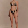 Slip bikini all’uncinetto Huntleigh – Stampa Sunshine nera e dorata Slip bikini all’uncinetto Huntleigh – Stampa Sunshine nera e dorata