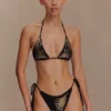 Slip bikini all’uncinetto Huntleigh – Stampa Sunshine nera e dorata Slip bikini all’uncinetto Huntleigh – Stampa Sunshine nera e dorata