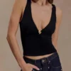 Top aderente Spencer con dettagli metallici – Nero