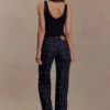 Top aderente Spencer con dettagli metallici – Nero