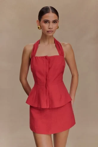 Top halter con peplo in lino Kallie – Rosa bruciato