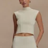 Top in maglia fasciata con collo alto Romaine – Avorio
