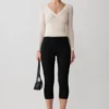 Top in rete a maniche lunghe Lumi – Colore osso