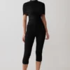 Top Linh Slinky con collo alto e arricciature – Nero