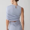 Top monospalla in lurex Adrienne – Blu pastello Top monospalla in lurex Adrienne – Blu pastello