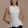 Top senza maniche a coste Diya con orlo a balze – Avorio Top senza maniche a coste Diya con orlo a balze – Avorio