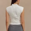 Top senza maniche con collo alto Ellia – Bianco Top senza maniche con collo alto Ellia – Bianco