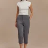 Top senza maniche con collo alto Ellia – Bianco Top senza maniche con collo alto Ellia – Bianco