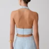 Top senza maniche con scollo all’americana plissettato Amaris – Azzurro Top senza maniche con scollo all’americana plissettato Amaris – Azzurro