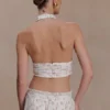 Top senza maniche con scollo all’americana plissettato Amaris – Stampa floreale a piccoli motivi Top senza maniche con scollo all’americana plissettato Amaris – Stampa floreale a piccoli motivi