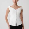 Top senza maniche con spalle scoperte e bottoni Billie – Bianco Top senza maniche con spalle scoperte e bottoni Billie – Bianco
