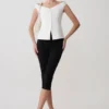 Top senza maniche con spalle scoperte e bottoni Billie – Bianco Top senza maniche con spalle scoperte e bottoni Billie – Bianco
