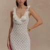 Vestito senza maniche in maglia con volant Brigid – Avorio Vestito senza maniche in maglia con volant Brigid – Avorio